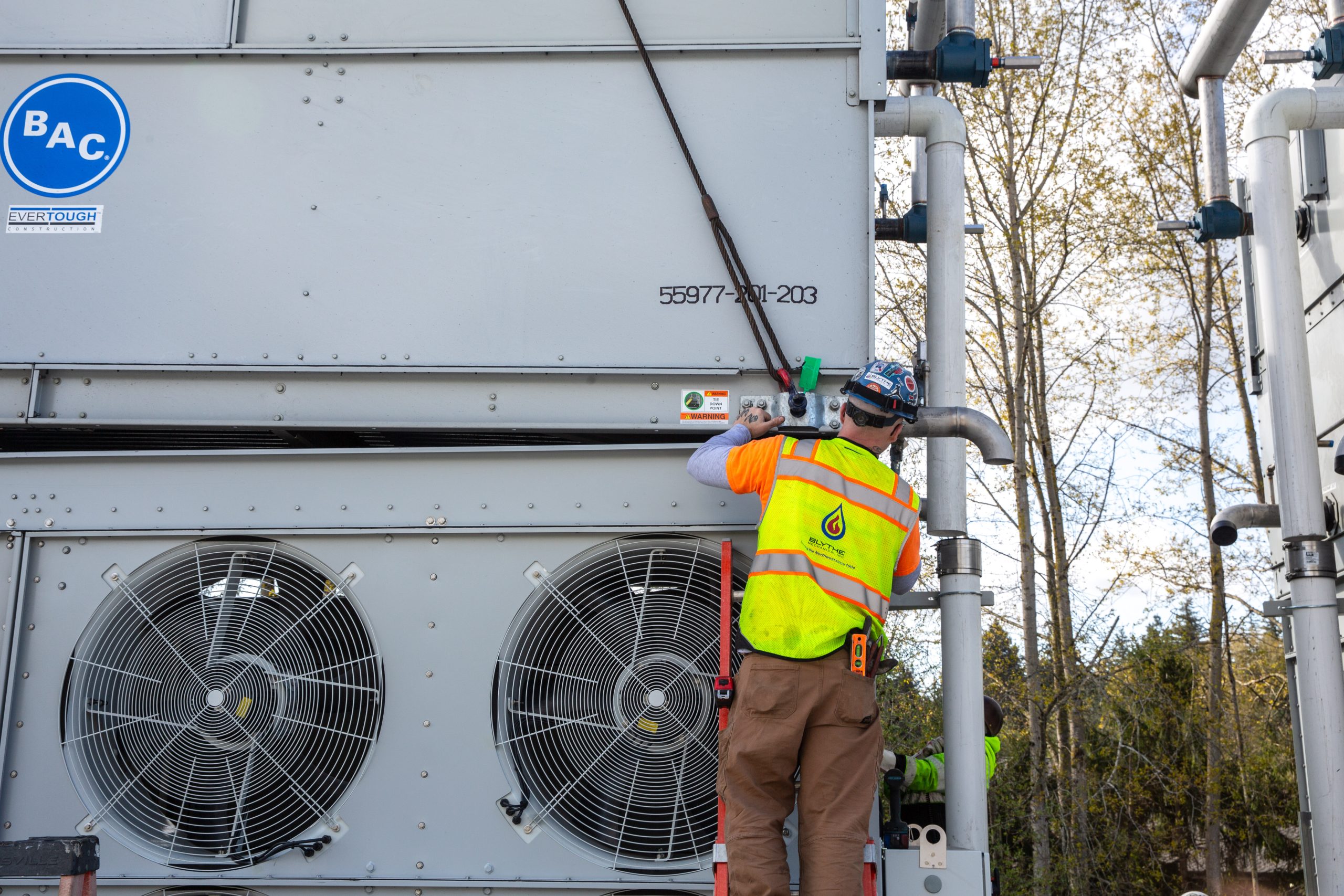 A Blythe Mechanical technician performing maintenance with a focus on safety, reliability, and quality workmanship across commercial mechanical systems.
